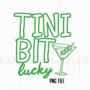 May include: Green graphic with the words "TINI BIT lucky" and a martini glass with three olives. The text "PNG FILE" is below the martini glass. The design is on a white background.