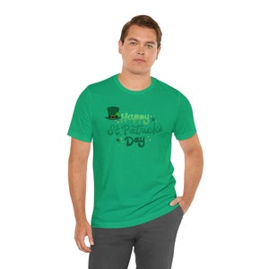 May include: A green t-shirt with a green shamrock and the text "Happy St. Patrick's Day" in a green gradient.