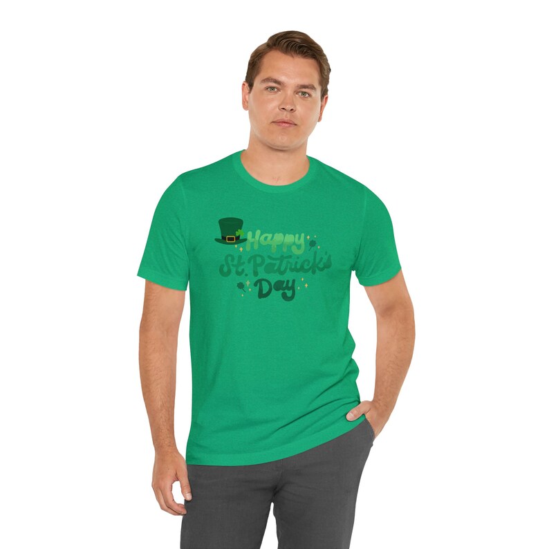 May include: A green t-shirt with a green shamrock and the text "Happy St. Patrick's Day" in a green gradient.