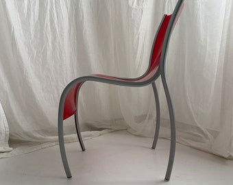 Ron Arad red armchair for Kartell, model FPE