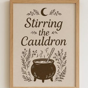 May include: A brown framed print with a black and white illustration of a cauldron with a crescent moon above it. The text reads "Stirring the Cauldron".