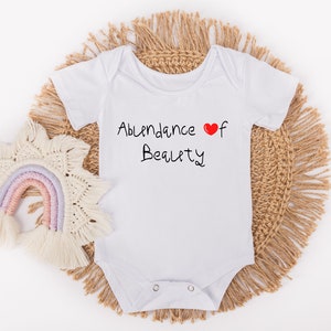Stylish Organic Cotton Baby Onesies | Soft and Comfortable | Customizable Designs | Eco-Friendly | Newborn to Toddler Sizes | Cute & Trendy