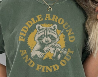 Funny Bluegrass Shirt for Women,"Festival‑Ready Raccoon Tee – ‘Fiddle Around and Find Out’ - Country Comfort Colors Tee