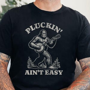 Funny Banjo Sasquatch T-Shirt: Bluegrass Bigfoot Music Lover Gift