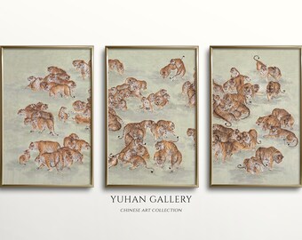 May include: A set of three framed prints depicting a group of tigers in a traditional Chinese style. The tigers are depicted in various poses, some standing, some lying down, and some walking. The prints are framed in gold frames and are hung on a white wall.