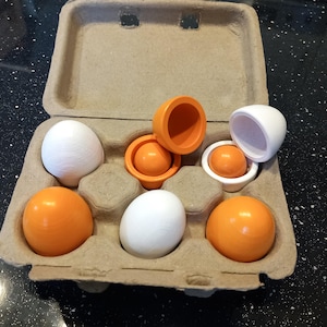 Egg box with wooden eggs