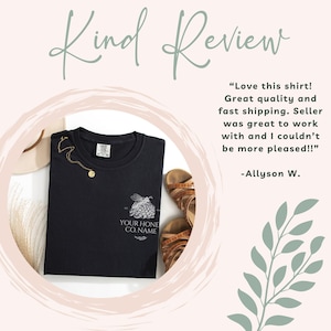 May include: A black t-shirt featuring a white graphic of a bee and honeycomb. The text "YOUR HONE CO. NAME" is printed below the graphic. The shirt is laid flat on a light pink background with a quote about the shirt and the seller's name.