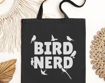 May include: Black tote bag with white text that reads "Bird Nerd" and a design of various birds.