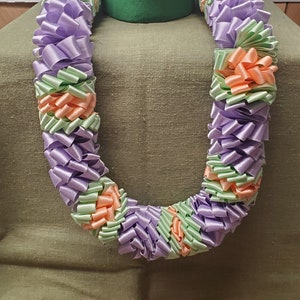 Ruban Lei violet/pêche/vert 36po