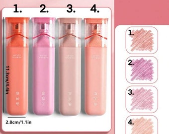 May include: Four Nebula Color markers in shades of coral, pink, peach, and rose, each 11.3cm tall and 2.8cm wide. The markers have transparent caps and include Chinese characters. Colour swatches of each shade are displayed.