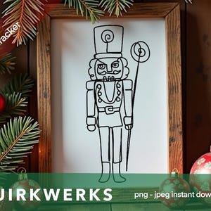 May include: A black and white line art illustration of a nutcracker holding a candy cane. The image is on a white background and is framed in a wooden frame.