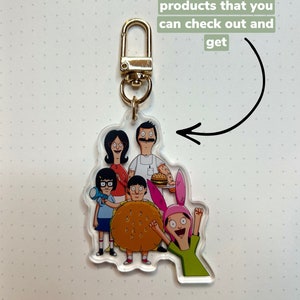 May include: A clear acrylic keychain featuring the characters from the animated television show Bob's Burgers. The characters include Bob, Linda, Tina, Gene, and Louise. The keychain is attached to a gold metal ring. "Also have other bob's burgers products that you can check out and get" is written in white text on a green background.