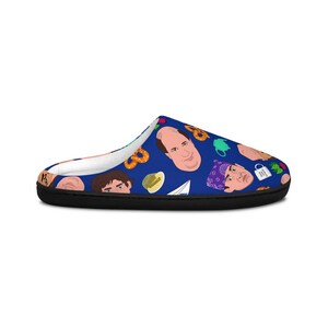 May include: Blue and white patterned slippers with a black sole. The pattern features images of characters from the TV show "The Office" and pretzels.