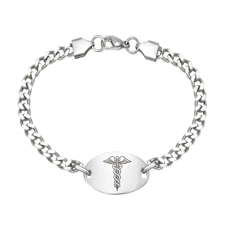 May include: A silver medical alert bracelet with a curb chain and an oval-shaped tag engraved with the medical symbol, the Rod of Asclepius.