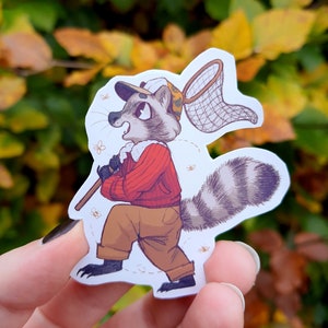 Wanderlust Waschbär Vinyl Matt / Glänzend Aufkleber | Niedlicher Pfadfinder Abenteurer Tier Aufkleber | Waldtier | Für Laptop, Notebook usw