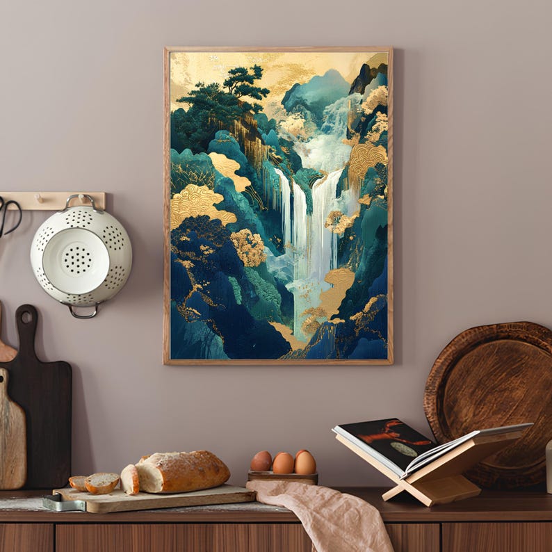 May include: A framed print of a waterfall cascading down a mountainside. The artwork features a blue and green color scheme with gold accents.