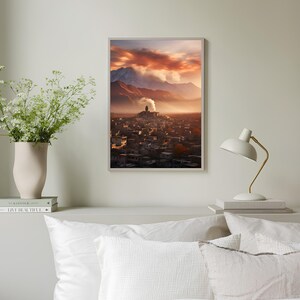 May include: A photograph of a city nestled in a valley with a mountain range in the background. The sky is a vibrant orange and pink, with clouds casting shadows over the city. A single building with a spire is visible in the centre of the city.