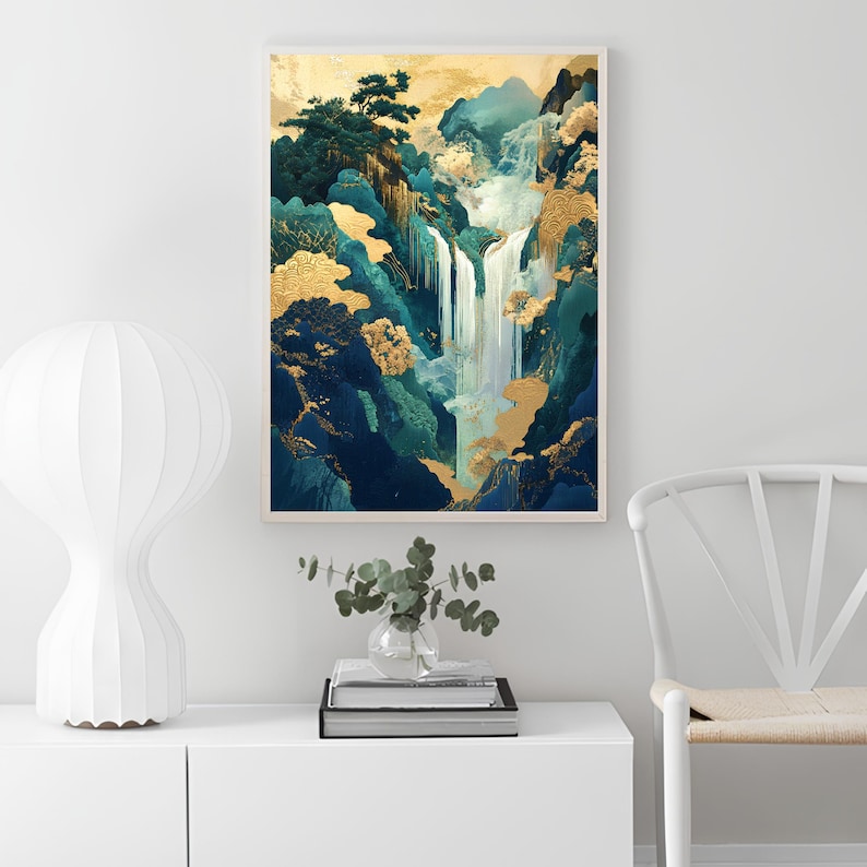 May include: Abstract painting of a waterfall cascading down a mountainside with gold and blue accents. The painting is framed and hanging on a white wall.
