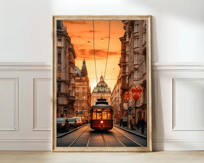 May include: A red vintage-style tram travels down a street lined with old buildings in a European city. The buildings are tall and have a yellow facade. The tram is traveling on a track with a golden glow in the background.