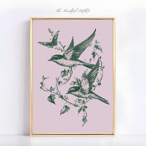 May include: A digital art print featuring two birds in flight with green foliage and a butterfly on a light pink background. The text "The Mindful Aesthete" is at the top of the print.