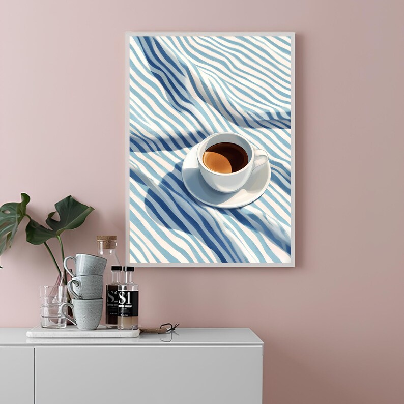 May include: A white coffee cup with a saucer filled with coffee sits on a blue and white striped fabric. The fabric is folded and has a shadow cast on it.