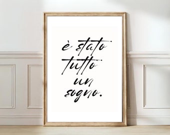 Puede incluir: Impresión tipográfica en blanco y negro con la frase italiana "è stato tutto un sogno." que se traduce como "Todo fue un sueño."