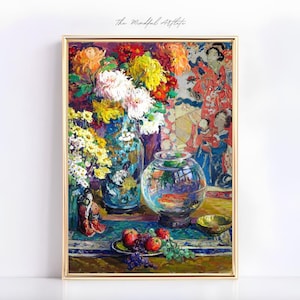 May include: A still life painting featuring a vase of colorful flowers, a goldfish bowl, and a bowl of red apples. The vase is blue and white with a floral pattern. The goldfish bowl is clear glass and contains a goldfish. The apples are red and green. The painting is framed in gold.