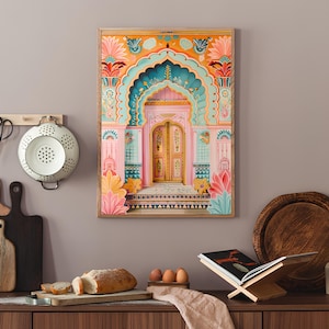 May include: A colorful illustration of a pink and blue doorway with a yellow door. The doorway is decorated with intricate floral patterns and geometric designs. The image is framed in wood.