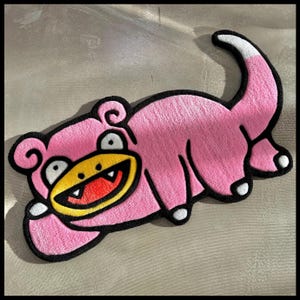 Zachtroze getuft vloerkleed met populair stripfiguur, cadeau-idee voor verjaardag en housewarming voor vrienden, broers en zussen en kinderen