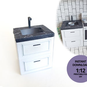 A digital printable template for a 1:12 scale dollhouse mini kitchen sink, designed for BMM system dollhouse setups. The template features a detailed, modern kitchen sink with a sleek faucet, ready to be printed on regular paper, cut, and assembled for a miniature kitchen scene.