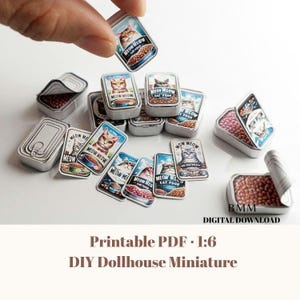 May include: Miniature cat food tins with illustrated labels showing cats and the text "Meow Meow Cat Food." Some tins are open, displaying a pink food filling. A hand holds one tin. DIY dollhouse miniature.