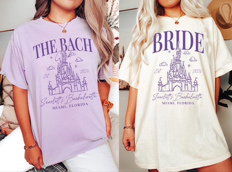 two women wearing t-shirts with the same design, featuring a castle and the text "THE BACH" and "Scarflet's Bachelorette Miami, Florida".