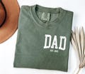 Comfort Colors® Custom Dad Shirt, Cute Fathers Day Gift, Christmas Gift For Dad, New Dad Shirt, Custom Dad Est Shirt, Gift for Grandpa product logo
