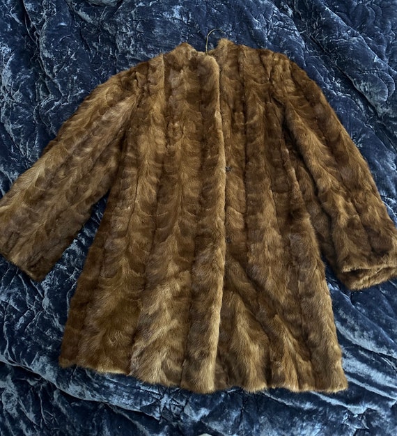 Vintage fur coat in pristine condition