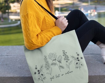 Get lost in nature with this high-quality, practical Flower Tote Bag. Embrace the outdoors in style!