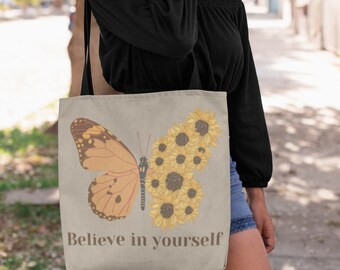 Believe in yourself, high-quality Tote Bag featuring a butterfly and sunflower. Carry positivity and style everywhere!