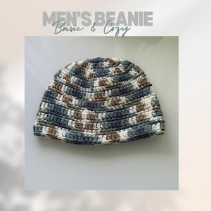 May include: A crocheted beanie in blue, brown, and white with a textured pattern. The beanie has the text "Men's Beanie Basic & Cozy" above it.