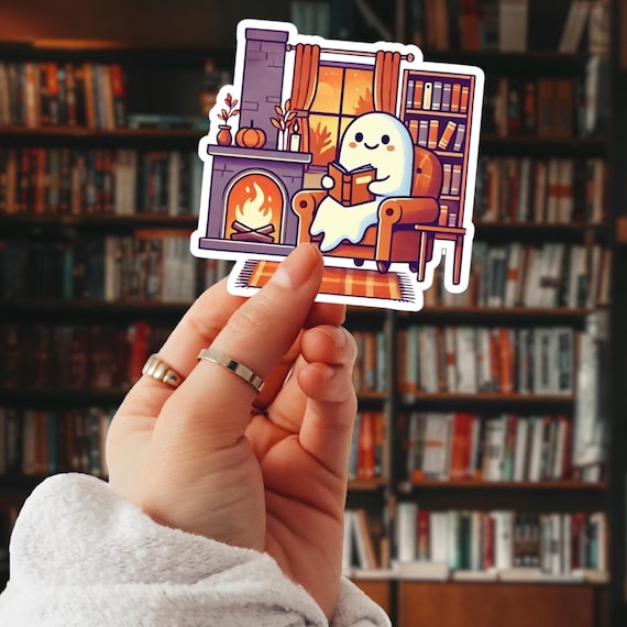 Cute Cozy Ghost Reading by Fireplace Sticker | Fall Aesthetic | Autumn Ghost Vinyl Sticker for Books, Journals, and Laptops