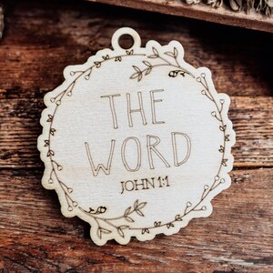 The Word - John 1:1 Name of Christ from the Bible Christmas Ornament collection.