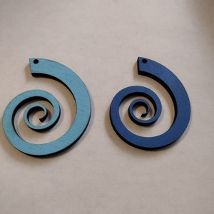 Laser cut wooden spiral necklace.