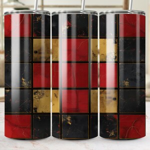 May include: Three stainless steel tumblers with a checkered pattern in red, black and gold. The tumblers are lined up in a row.
