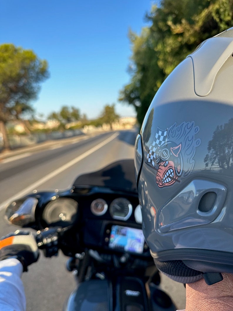 Fast Johnnie hog sticker on a helmet