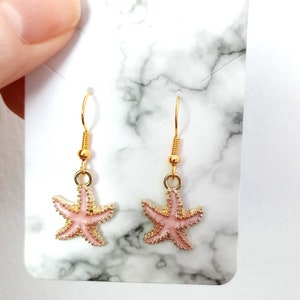 Pale pink starfish enamel earrings, marine sealife jewellery, dangle earrings on gold wire make a great gift