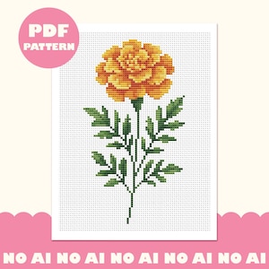 May include: A cross-stitch pattern featuring a yellow and orange marigold flower with green leaves on a white grid background. A pink circle in the top left corner contains the white text PDF PATTERN. The bottom edge has the text NO AI.