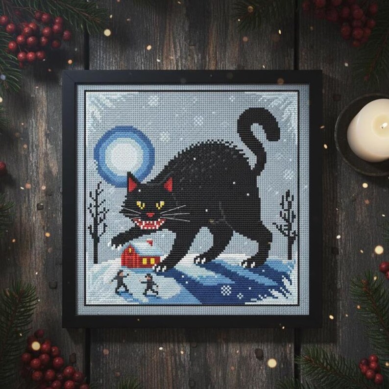 The Yule Cat cross stitch design embroidered on a light grey fabric, highlighting the snowy winter landscape and moonlight.