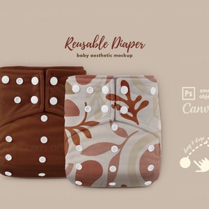 May include: Two reusable cloth diapers, one brown with white snaps and the other with a brown and beige floral pattern. The diapers are laid out on a beige background. The text "Reusable Diaper" and "baby aesthetic mockup" is above the diapers.