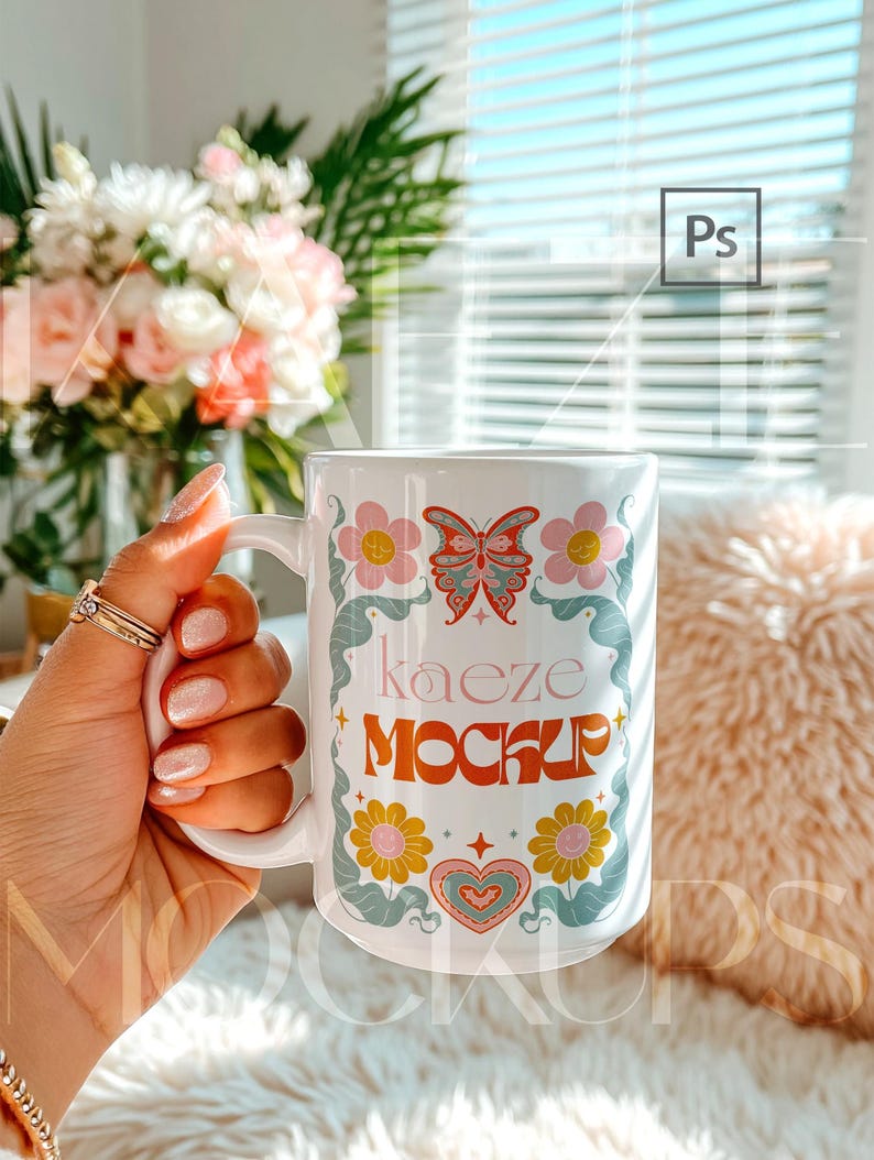 Trendy hand held mug mockup showing a 15oz ceramic mug with colorful retro floral design applied. Natural lifestyle composition with realistic grip, highlights, and ceramic reflections. Editable mug body allows seamless artwork replacement in Photoshop or Canva. Ideal mug mockups for creative sellers and modern 15oz mug mockup displays.