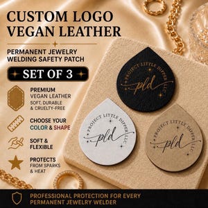 May include: A set of three teardrop-shaped vegan leather welding safety patches for permanent jewelry. The patches are black, white, and tan, each featuring the text Project Little Dipper LLC and a script pld logo with small star accents.
