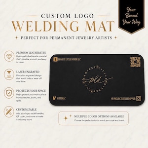 May include: A rectangular black leatherette welding mat featuring a laser-engraved logo for Project Little Dipper LLC in the center. The mat includes social media handles, a Facebook icon, and a QR code printed in gold on the surface.