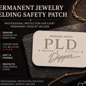 May include: A rectangular, light-colored leather safety patch for permanent jewelry welding, featuring the embossed text PLD PROJECT LITTLE DIPPER. The patch is displayed alongside gold chains, with text detailing features like genuine cowhide or sheep skin, size, color, shape, and heat protection.